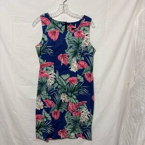 Hawaiian blue tropical print dress is a sleeveless sheath or midi style